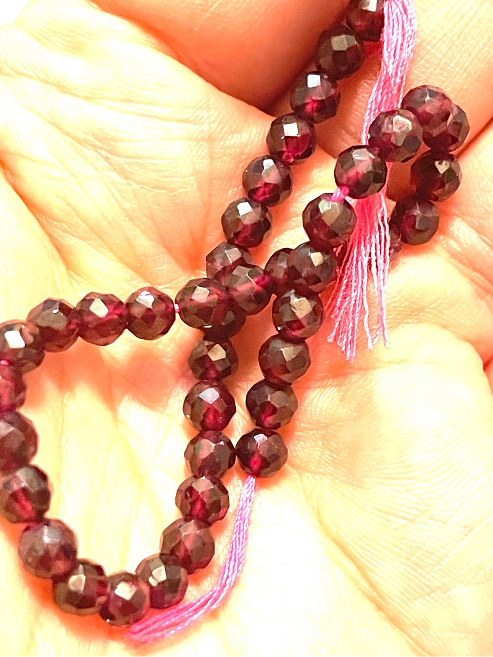 Strand of Faceted Garnet Beads